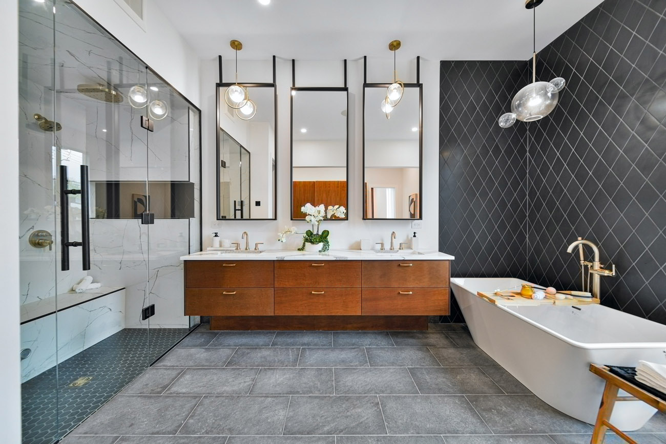 Luxury bathroom black and grey with large shower and tub