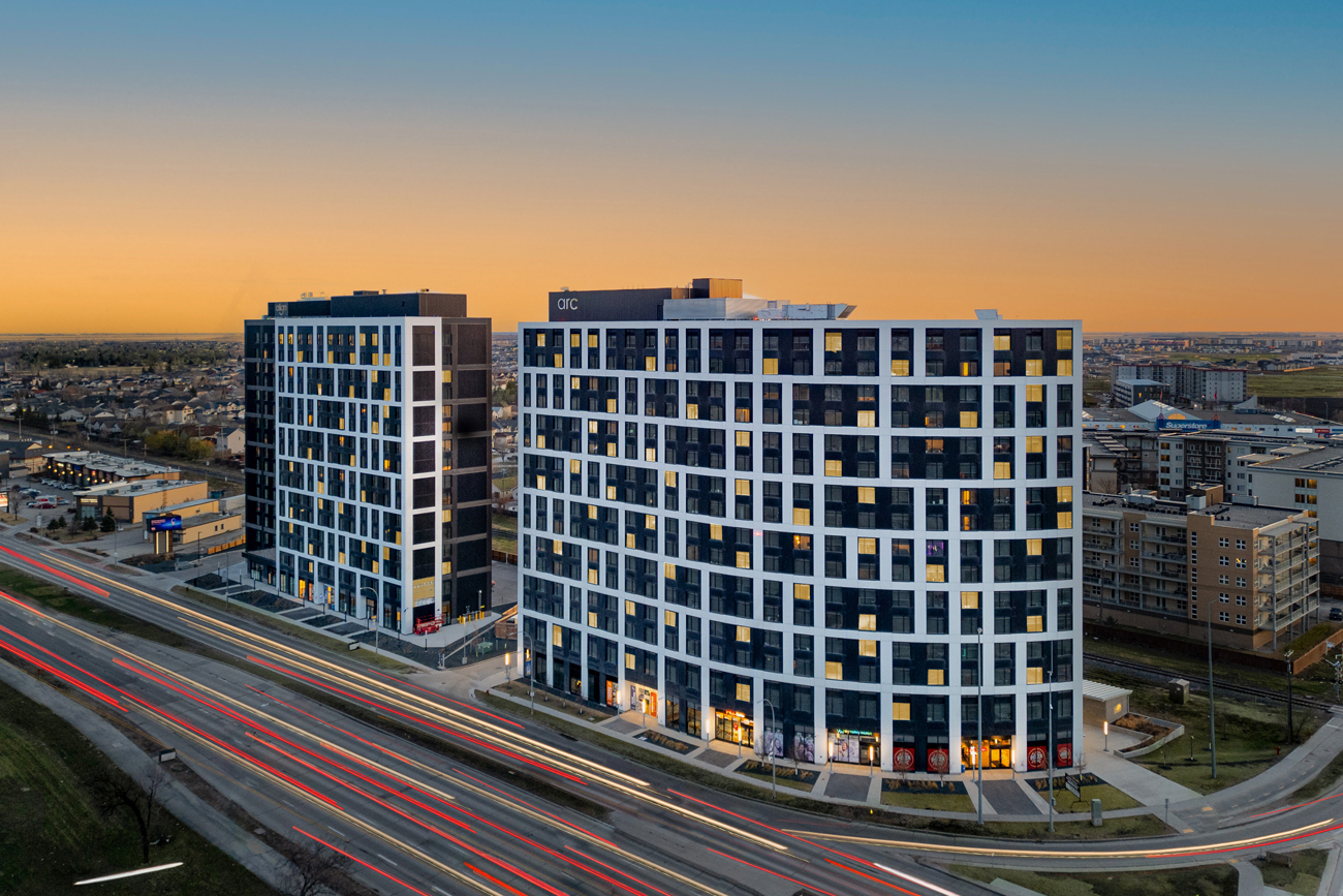 Drone shot of apartment complex at sunset