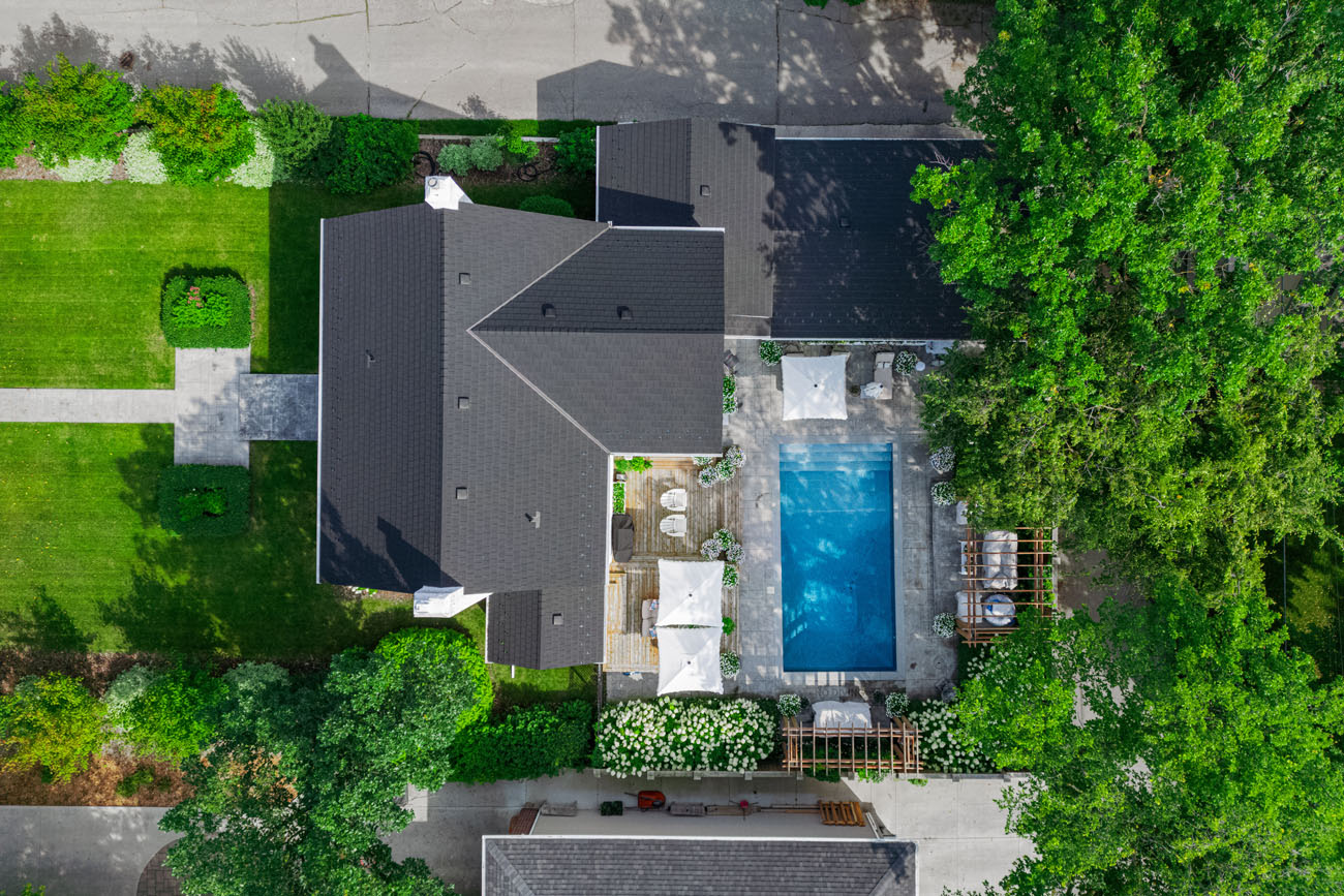 birdseye drone image of property and pool